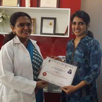 DR.PRASHANTHI RECIEVING FELLOWSHIP CERTIFICATE                   